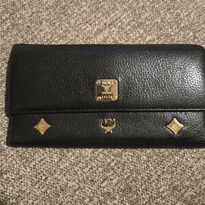 MCM Black Wallet with Gold Accents